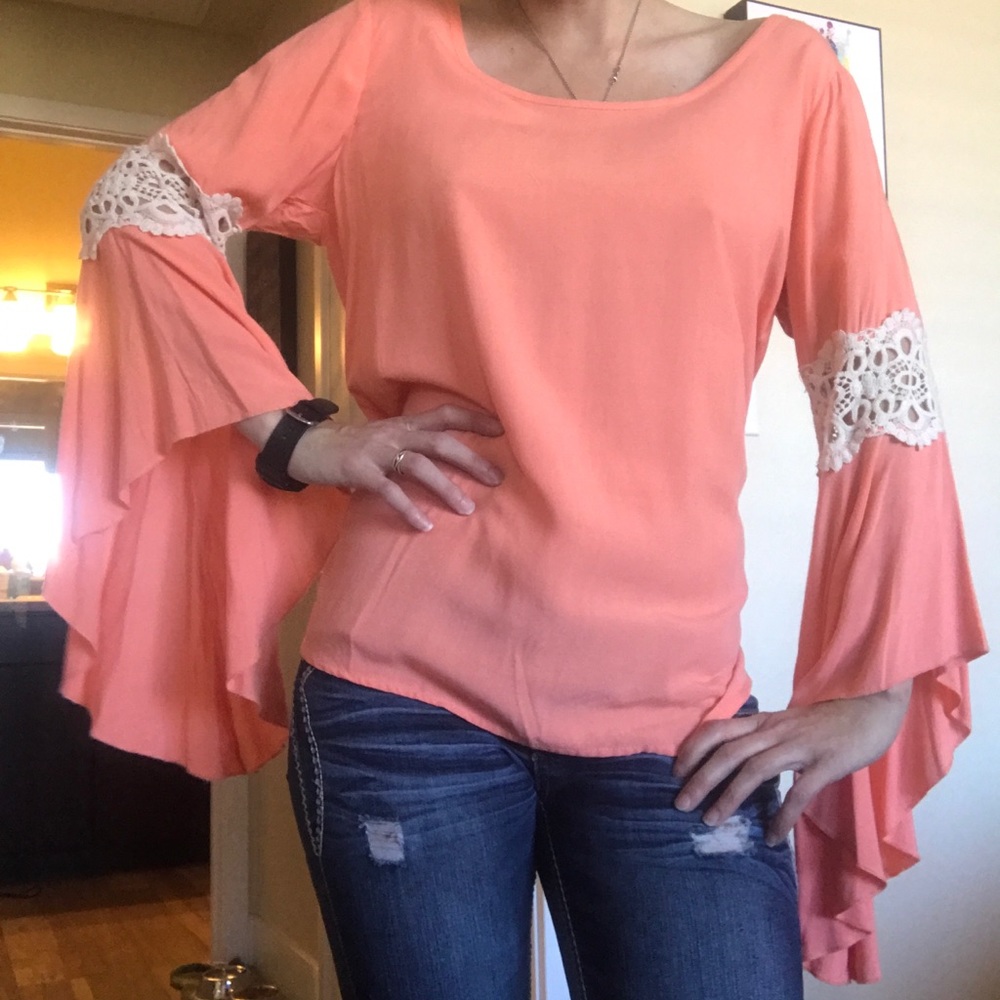 Coral colored altered state shirt
